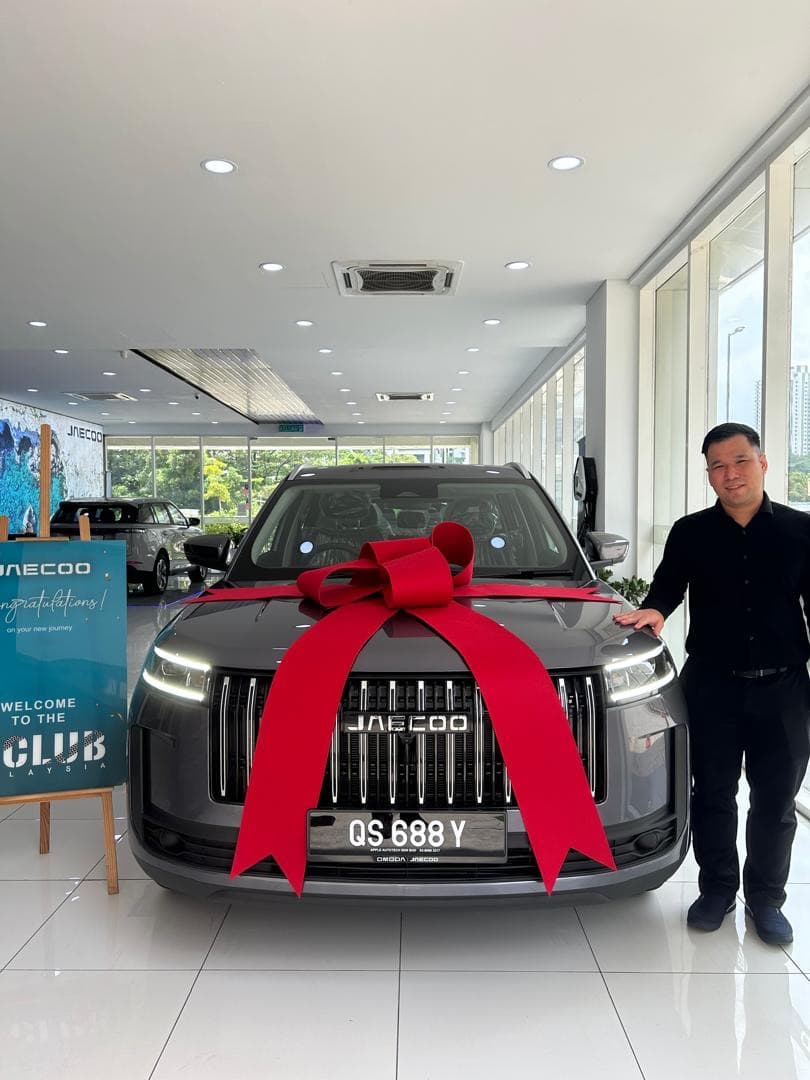 Customer collecting a Jaecoo J8 at Apple Autotech Sdn. Bhd., Bukit Jalil