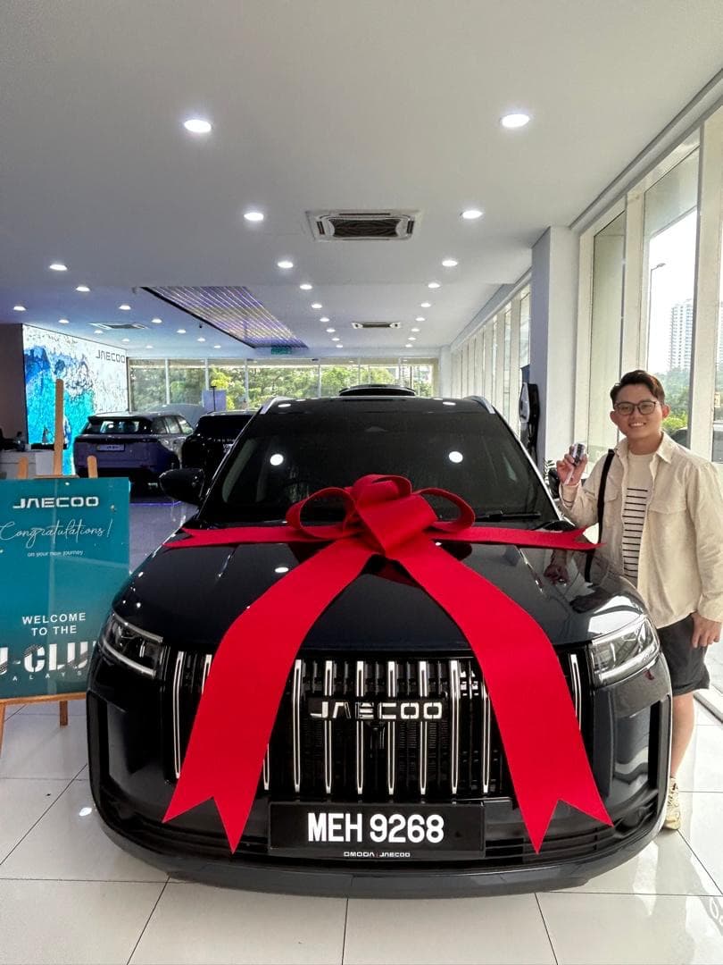 Customer collecting a Jaecoo J8 at Apple Autotech Sdn. Bhd., Bukit Jalil