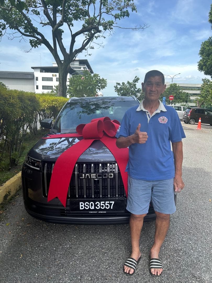 Customer collecting a Jaecoo J8 at Apple Autotech Sdn. Bhd., Bukit Jalil