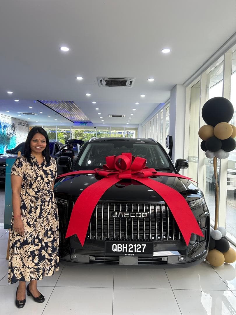 Customer collecting a Jaecoo J8 at Apple Autotech Sdn. Bhd., Bukit Jalil