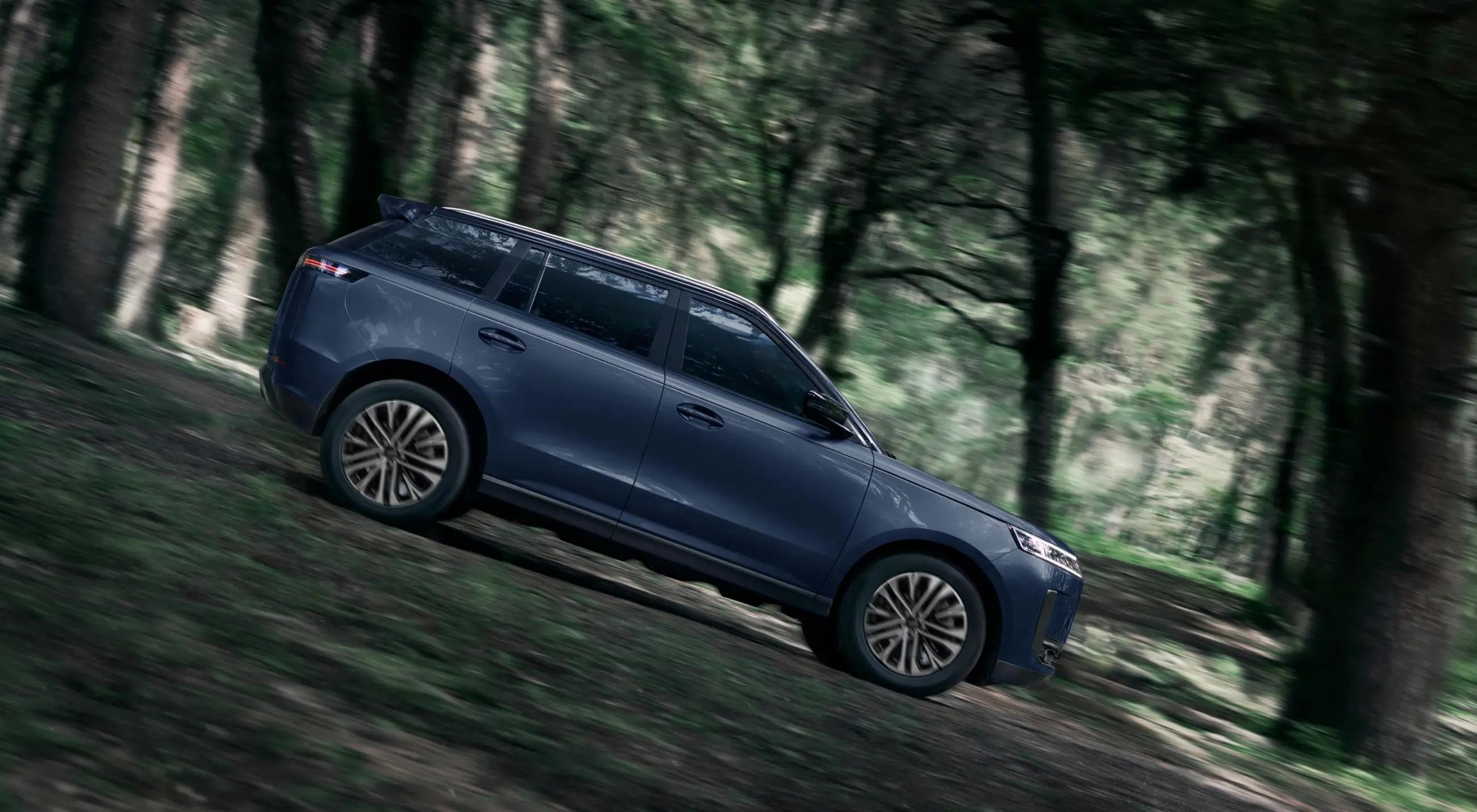 Jaecoo J5 climbing a forest trail