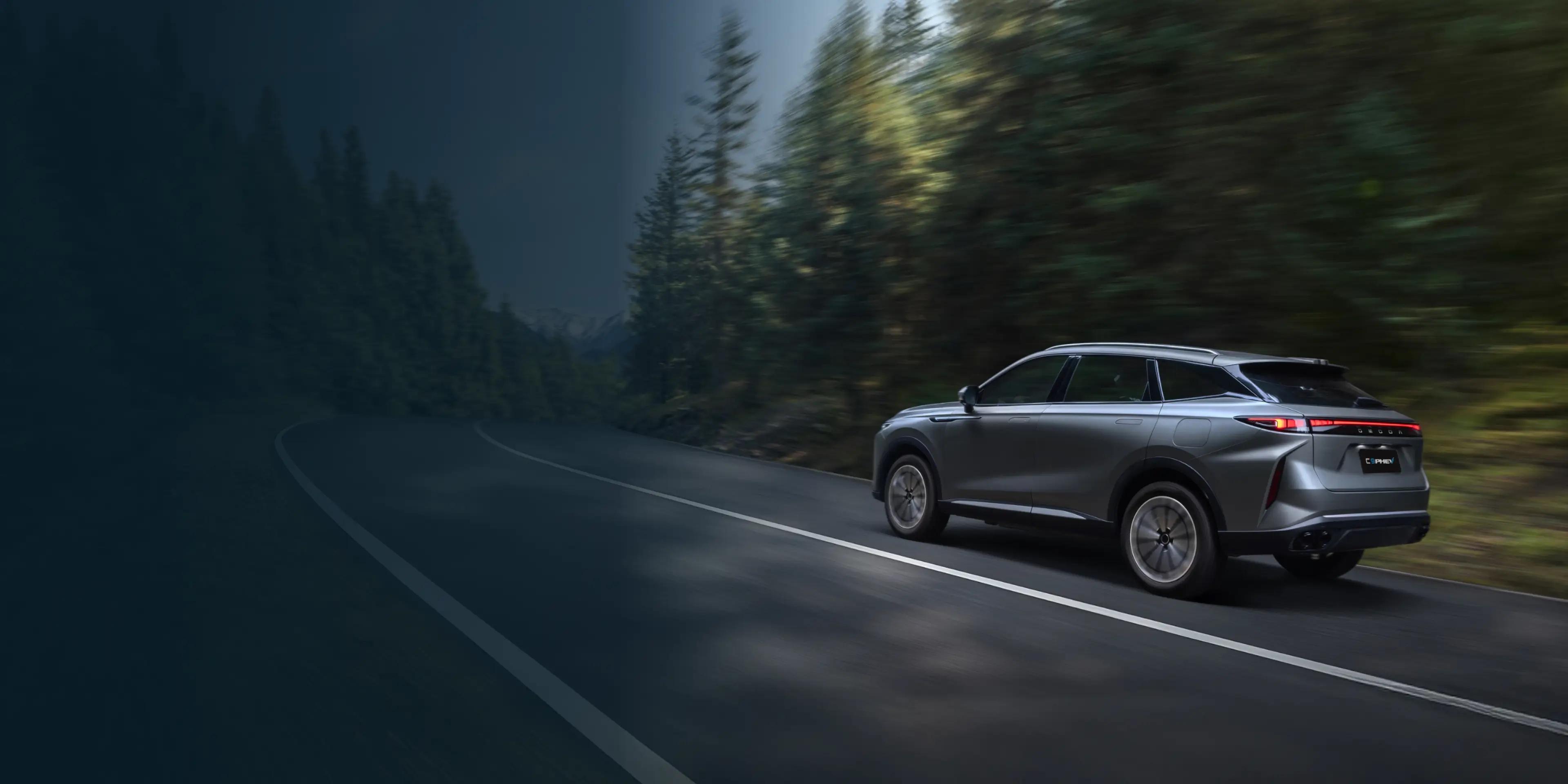 Omoda C9 PHEV on a forest road